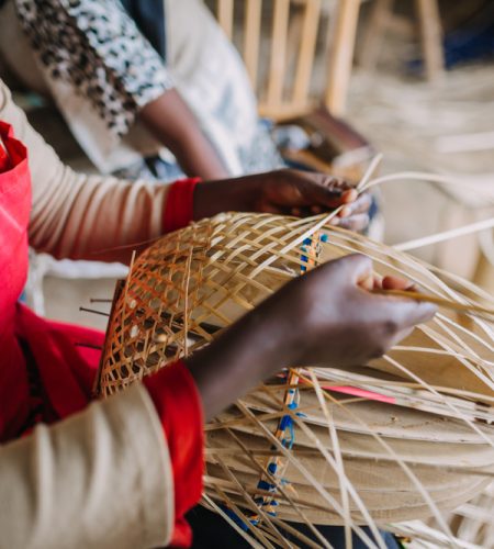 Woman,Weaving,A,Basket,Out,Of,Bamboo,In,Rwanda,Africa